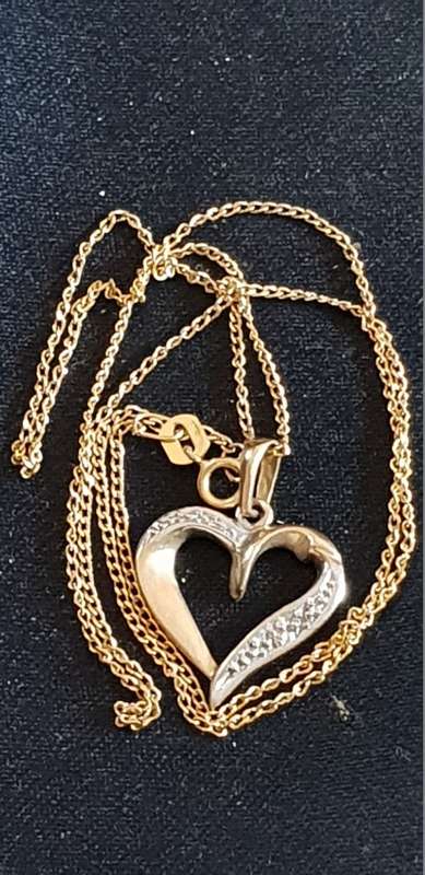 9CT Gold Necklace with a real diamond heart pendant