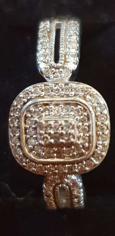 Stunning 9CT white gold and 60x Genuine Diamonds engagement ring