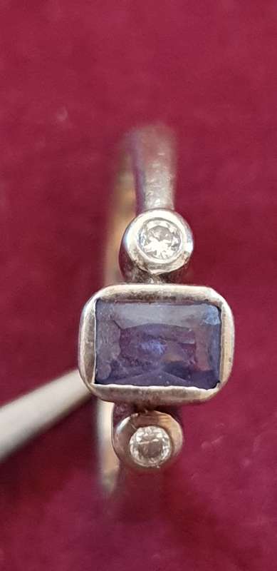 Genuine 9ct white gold ring with synthetic tanzanite and c.z`s