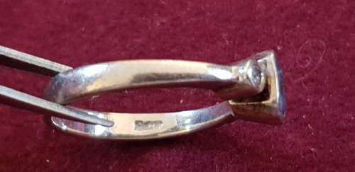 Genuine 9ct white gold ring with synthetic tanzanite and c.z`s