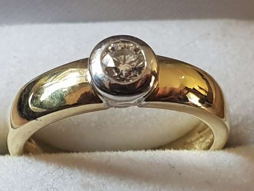 18ct yellow and white gold tube set  solitaire 0.34 carat diamond ring