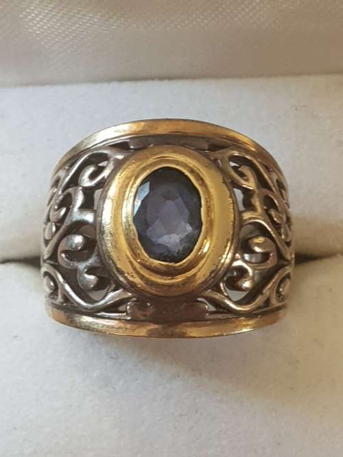 9ct gold and silver ring with blue saphire