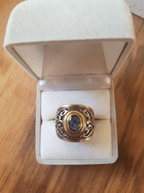 9ct gold and silver ring with blue saphire