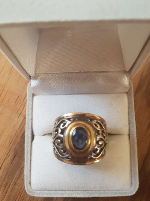 9ct gold and silver ring with blue saphire