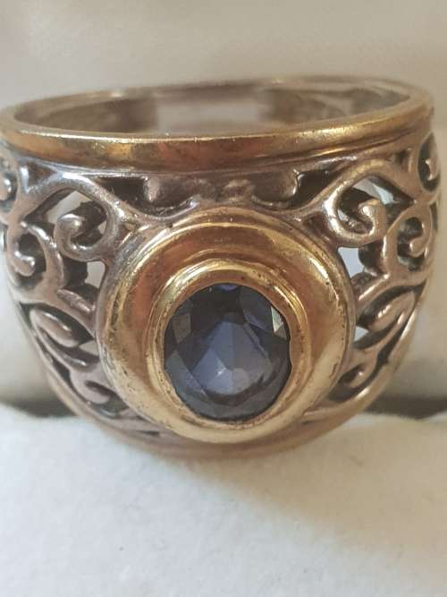 9ct gold and silver ring with blue saphire