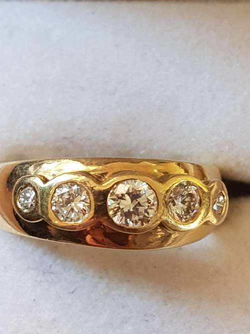 Genuine 18ct gold and five genuine natural diamond Dress ring