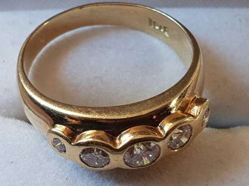Genuine 18ct gold and five genuine natural diamond Dress ring