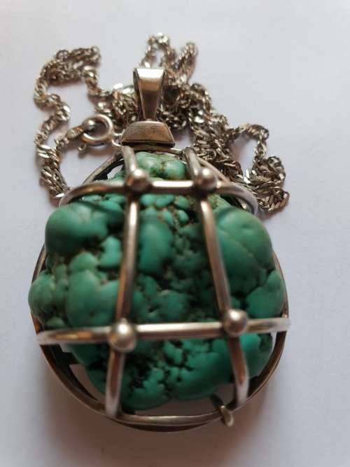Rough Natural Raw Turquoise in Sterling silver hand made cage