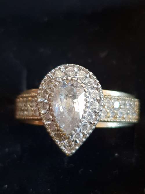 9ct gold and Pear shaped Cubic Zirconia Halo Engagement Ring