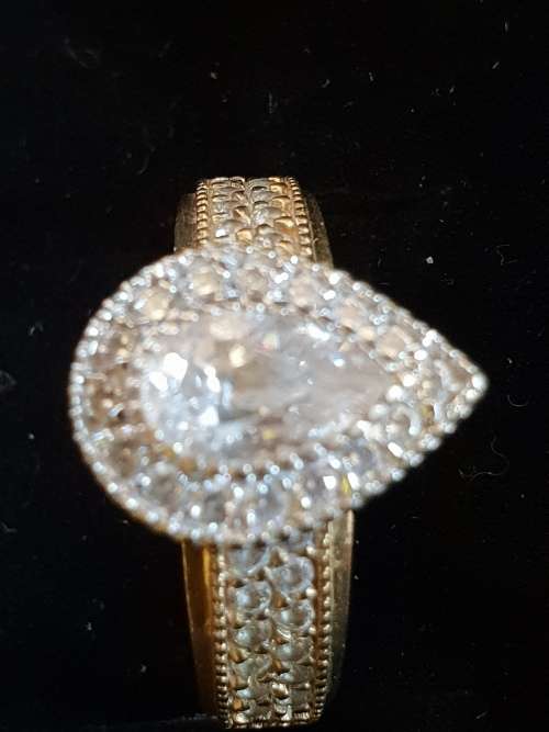 9ct gold and Pear shaped Cubic Zirconia Halo Engagement Ring