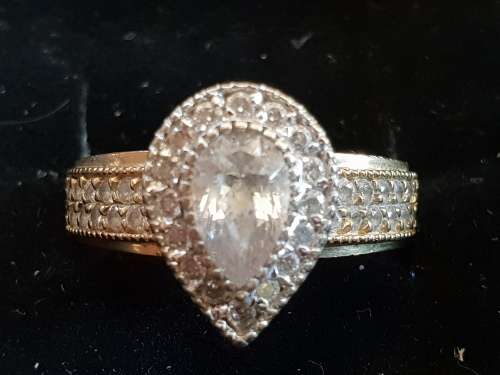 9ct gold and Pear shaped Cubic Zirconia Halo Engagement Ring