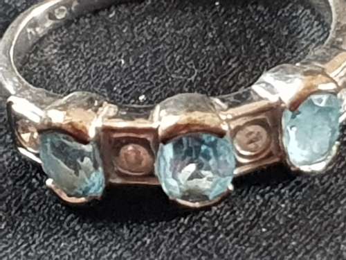 9ct white gold with blue Topaz and Diamond ring