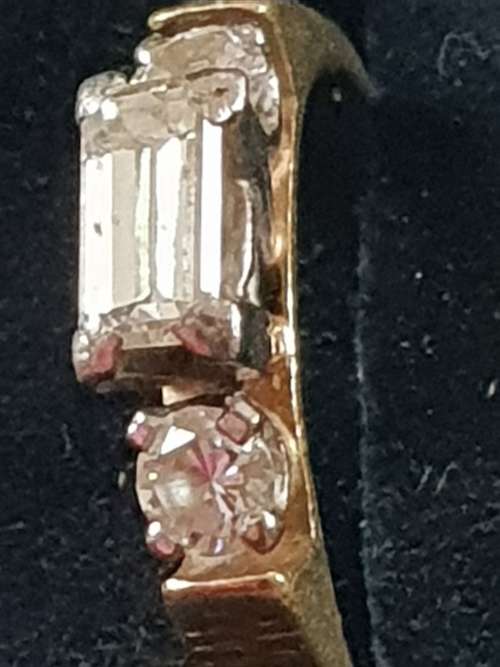Genuine 18ct and 1/2 carat straight baguette cut Diamond Ring with 2 round cut diamond either side