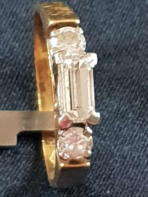 Genuine 18ct and 1/2 carat straight baguette cut Diamond Ring with 2 round cut diamond either side