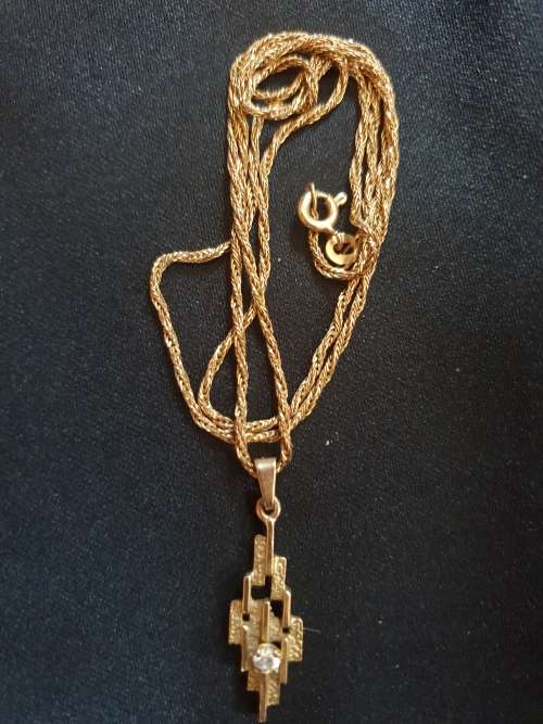 9ct yellow gold and C.Z necklace and pendant set