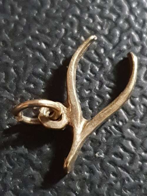 Genuine 9ct gold wish bone pendant