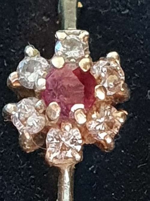 Vintage and hallmarked 18ct yellow gold ,diamond and Ruby ring
