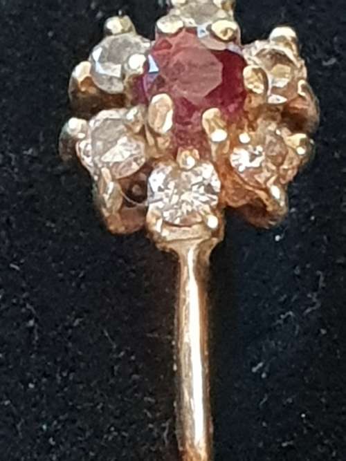Vintage and hallmarked 18ct yellow gold ,diamond and Ruby ring