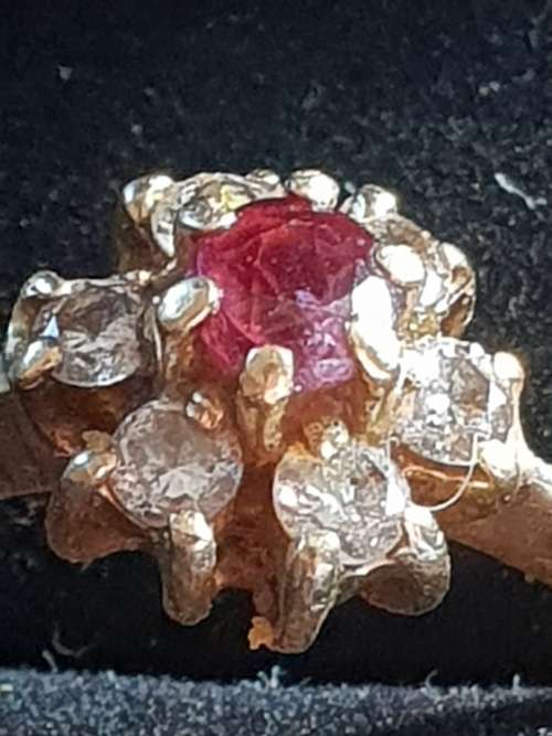 Vintage and hallmarked 18ct yellow gold ,diamond and Ruby ring