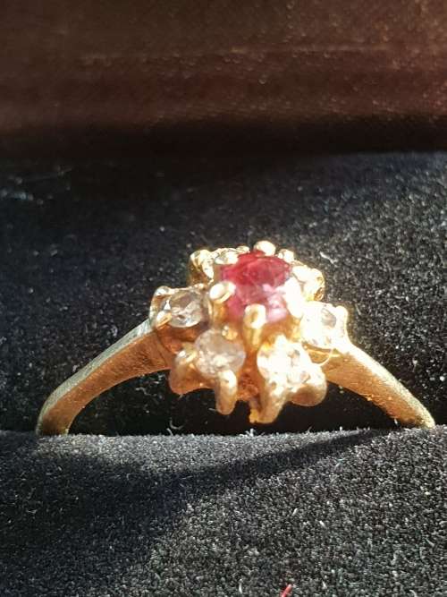 Vintage and hallmarked 18ct yellow gold ,diamond and Ruby ring