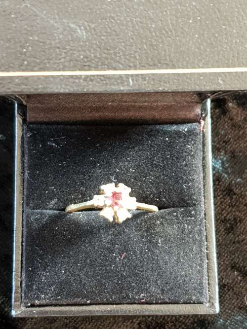 Vintage and hallmarked 18ct yellow gold ,diamond and Ruby ring