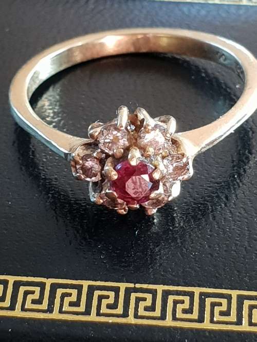 Vintage and hallmarked 18ct yellow gold ,diamond and Ruby ring