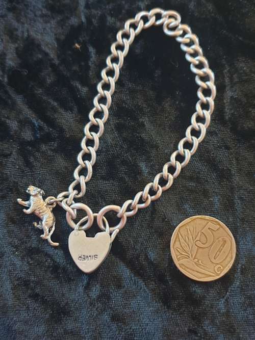 Heavy Sterling Silver bracelet with padlock and lioness charm-reduced