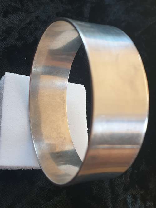 Lovely-Very Heavy and broad Sterling Silver Bangle