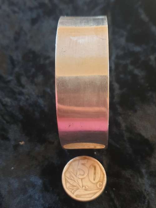 Lovely-Very Heavy and broad Sterling Silver Bangle