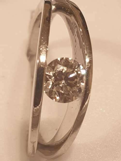 Platinum and 0.44 carat genuine Diamond solitaire Ring