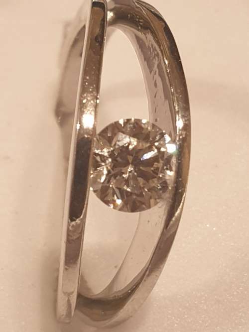 Platinum and 0.44 carat genuine Diamond solitaire Ring
