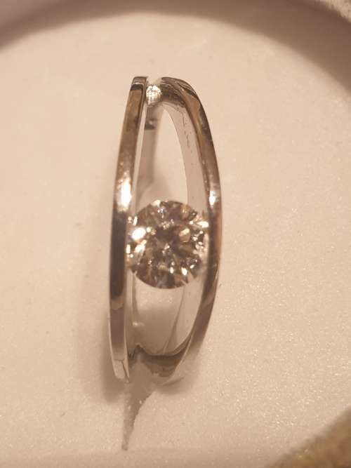 Platinum and 0.44 carat genuine Diamond solitaire Ring