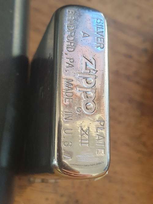 Highly Collectable and Rare Silver Plated 1935 Varga girl Zippo lighter 332/500
