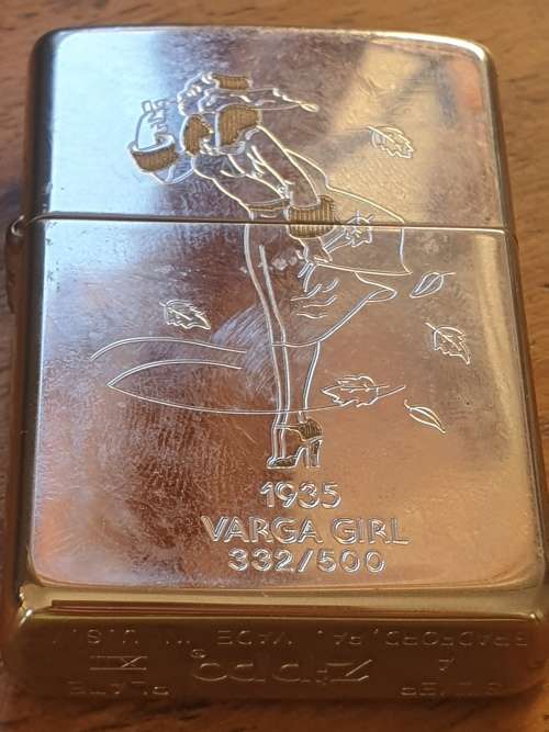 Highly Collectable and Rare Silver Plated 1935 Varga girl Zippo lighter 332/500
