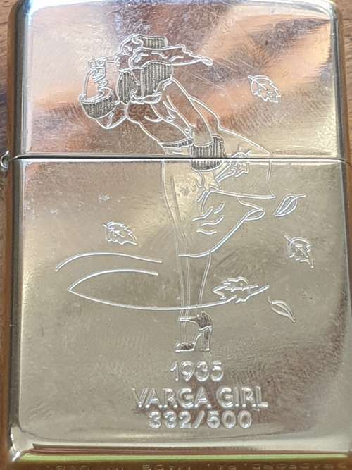Highly Collectable and Rare Silver Plated 1935 Varga girl Zippo lighter 332/500