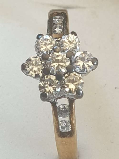 9CT yellow gold and Diamond flower ring hallmarked