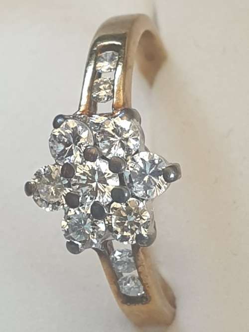 9CT yellow gold and Diamond flower ring hallmarked