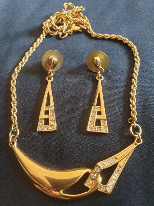 Gold plated modern necklace with matching earrings