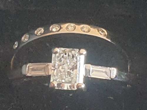 Genuine Platinium and Radiant cut 0.46 carat  Diamond ring set