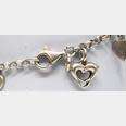 Sterling Silver cute bracelet with hearts and dolphins
