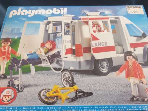 Playmobil Ambulance toy in box with figurines.