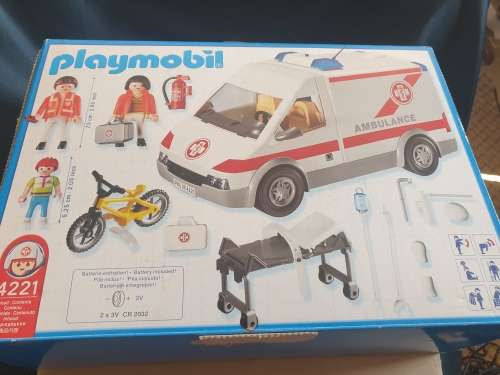Playmobil Ambulance toy in box with figurines.