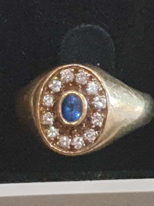 18CT SOLID GOLD AND TANZANITE AND NATURAL DIAMOND ENGAGEMENT RING