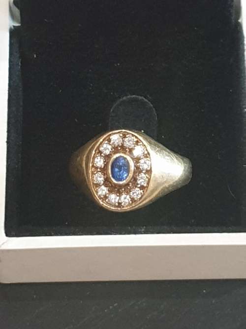 18CT SOLID GOLD AND TANZANITE AND NATURAL DIAMOND ENGAGEMENT RING