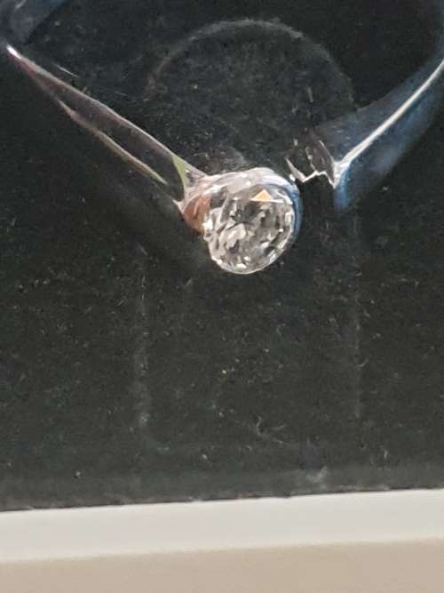 18ct and Rhodium and 0.25 carat genuine Solitaire Diamond Ring