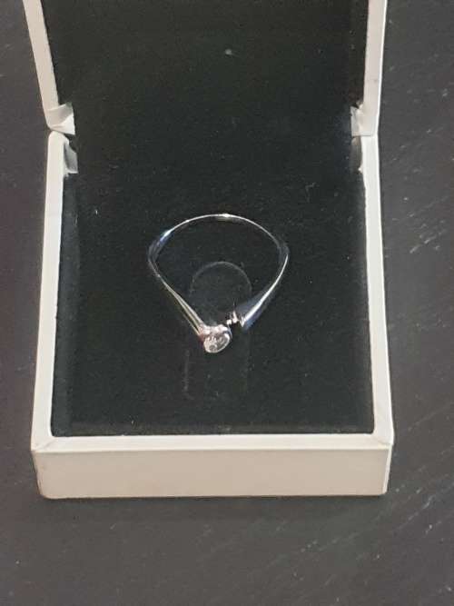 18ct and Rhodium and 0.25 carat genuine Solitaire Diamond Ring
