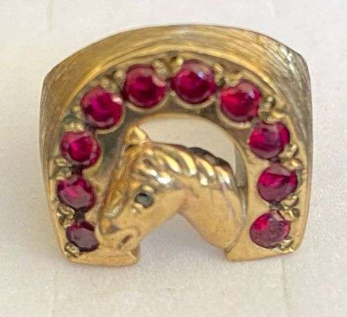 Stunning 9ct yellow gold men`s Horse shoe ring with approx 1.75 carats of ruby`s