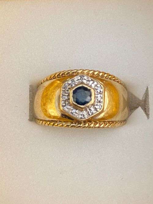 9ct yellow gold with sapphire and approx 11 diamond`s