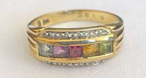 Stunning multicoloured gem stone ring in 9ct yellow gold with 8 diamonds on the sides