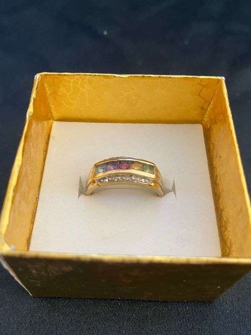 Stunning multicoloured gem stone ring in 9ct yellow gold with 8 diamonds on the sides